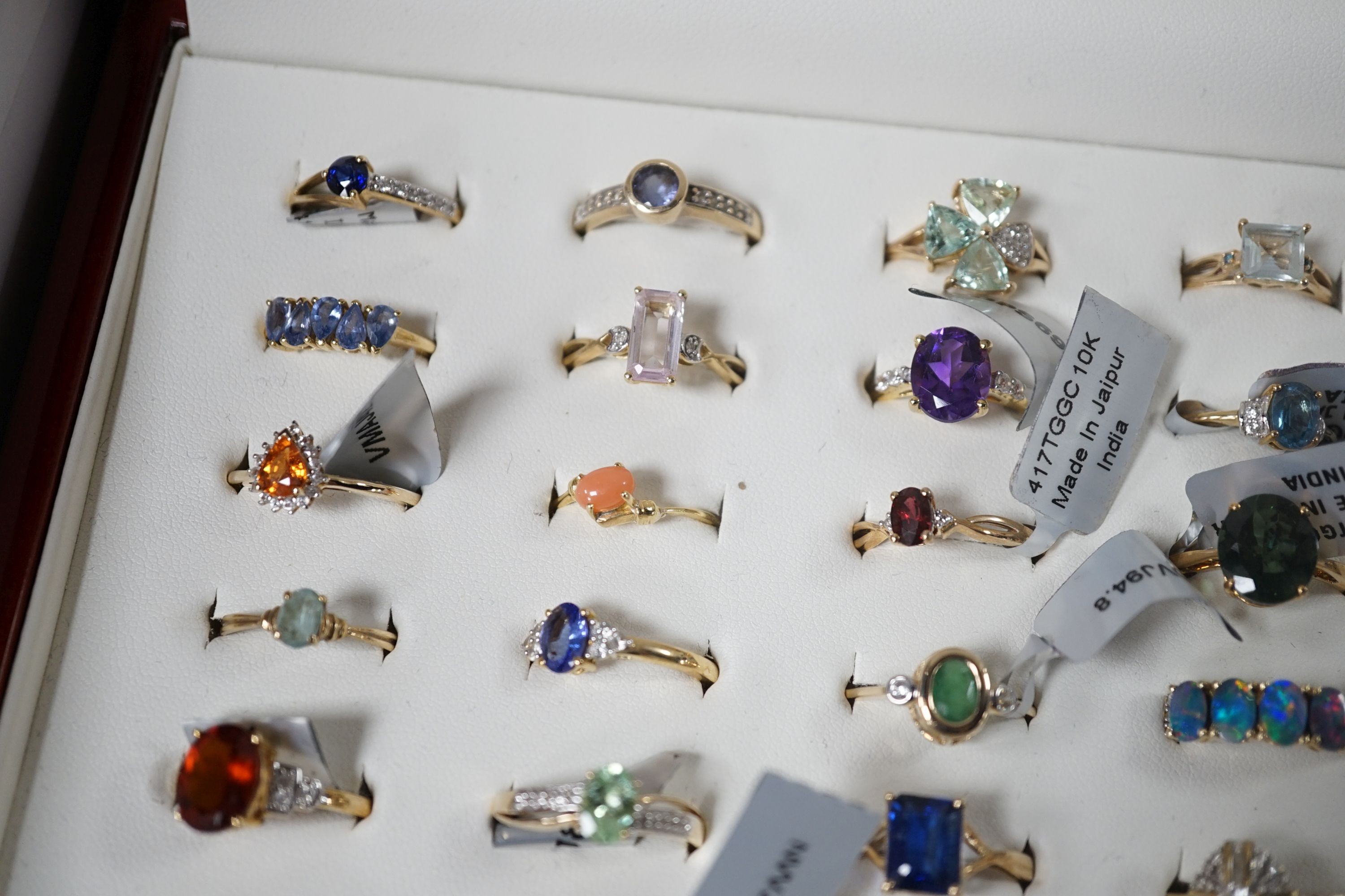A collection of forty five assorted 9ct gold and gem set rings, including opal, emerald and amethyst, one 14ct gold and gem set ring and four 925 rings.